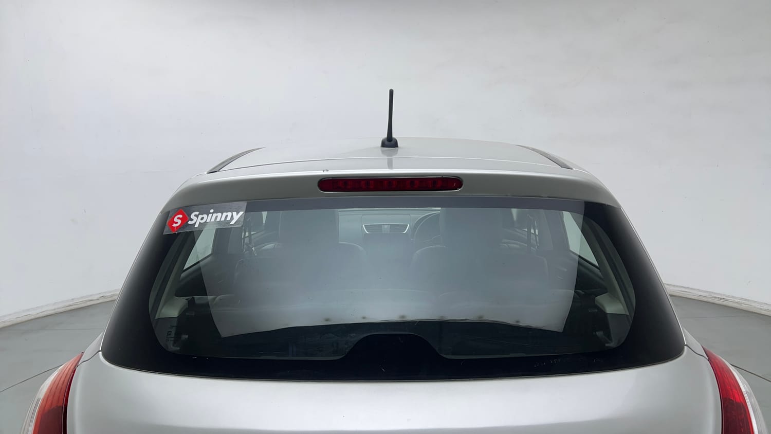 Used 2015 Maruti Suzuki Swift Lxi (O) Petrol Manual exterior BACK WINDSHIELD VIEW