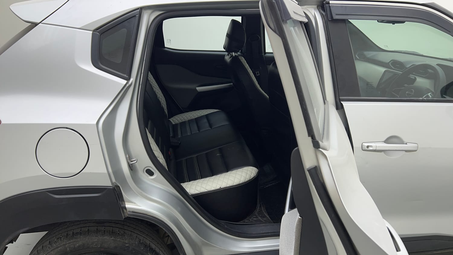 Used 2022 Nissan Magnite XE Petrol Manual interior RIGHT SIDE REAR DOOR CABIN VIEW