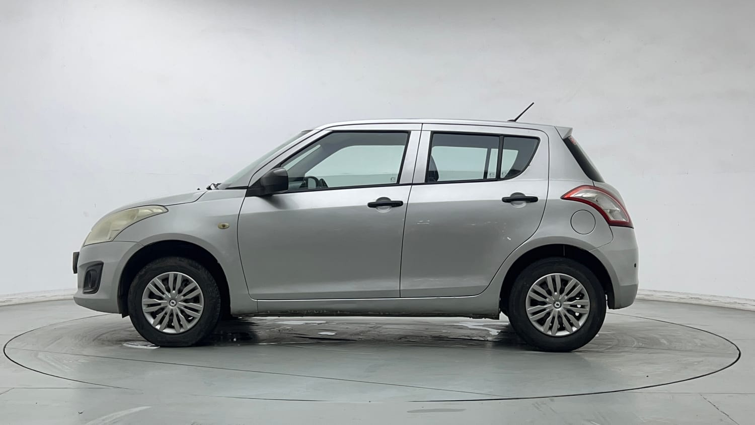 Used 2015 Maruti Suzuki Swift Lxi (O) Petrol Manual exterior LEFT SIDE VIEW