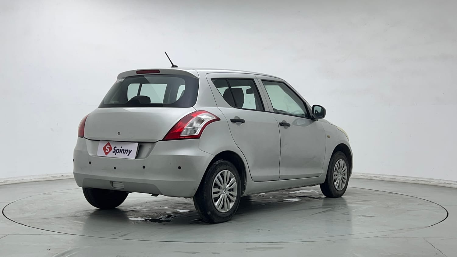 Used 2015 Maruti Suzuki Swift Lxi (O) Petrol Manual exterior RIGHT REAR CORNER VIEW