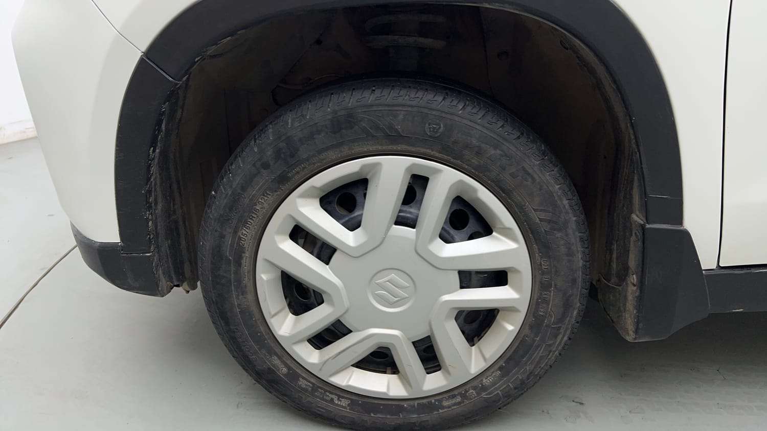 Used 2021 maruti-suzuki Vitara Brezza VXi Petrol Manual tyres LEFT FRONT TYRE RIM VIEW