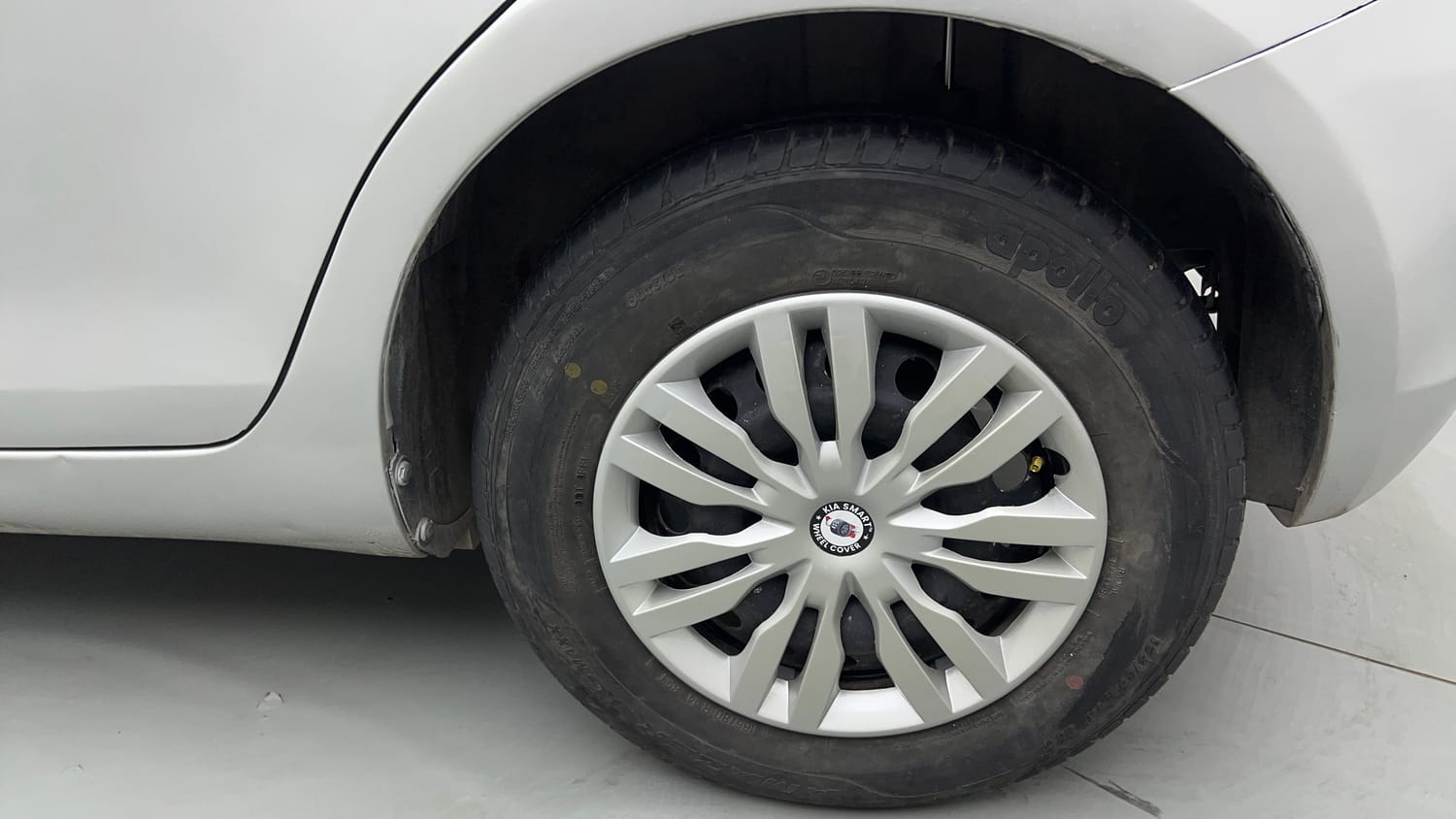 Used 2015 Maruti Suzuki Swift Lxi (O) Petrol Manual tyres LEFT REAR TYRE RIM VIEW