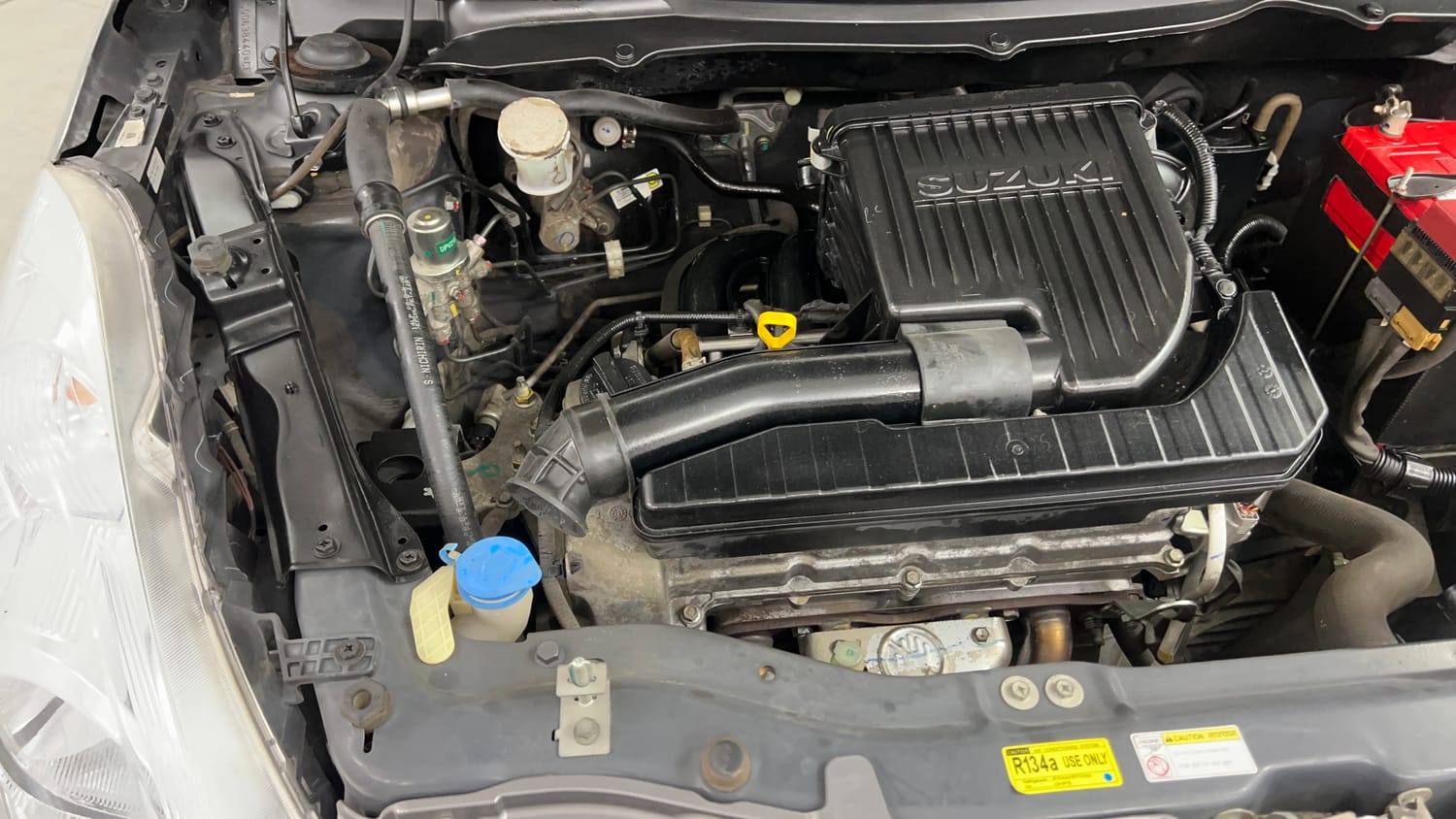 Used 2014 Maruti Suzuki Swift VXi Petrol Manual engine ENGINE RIGHT SIDE VIEW