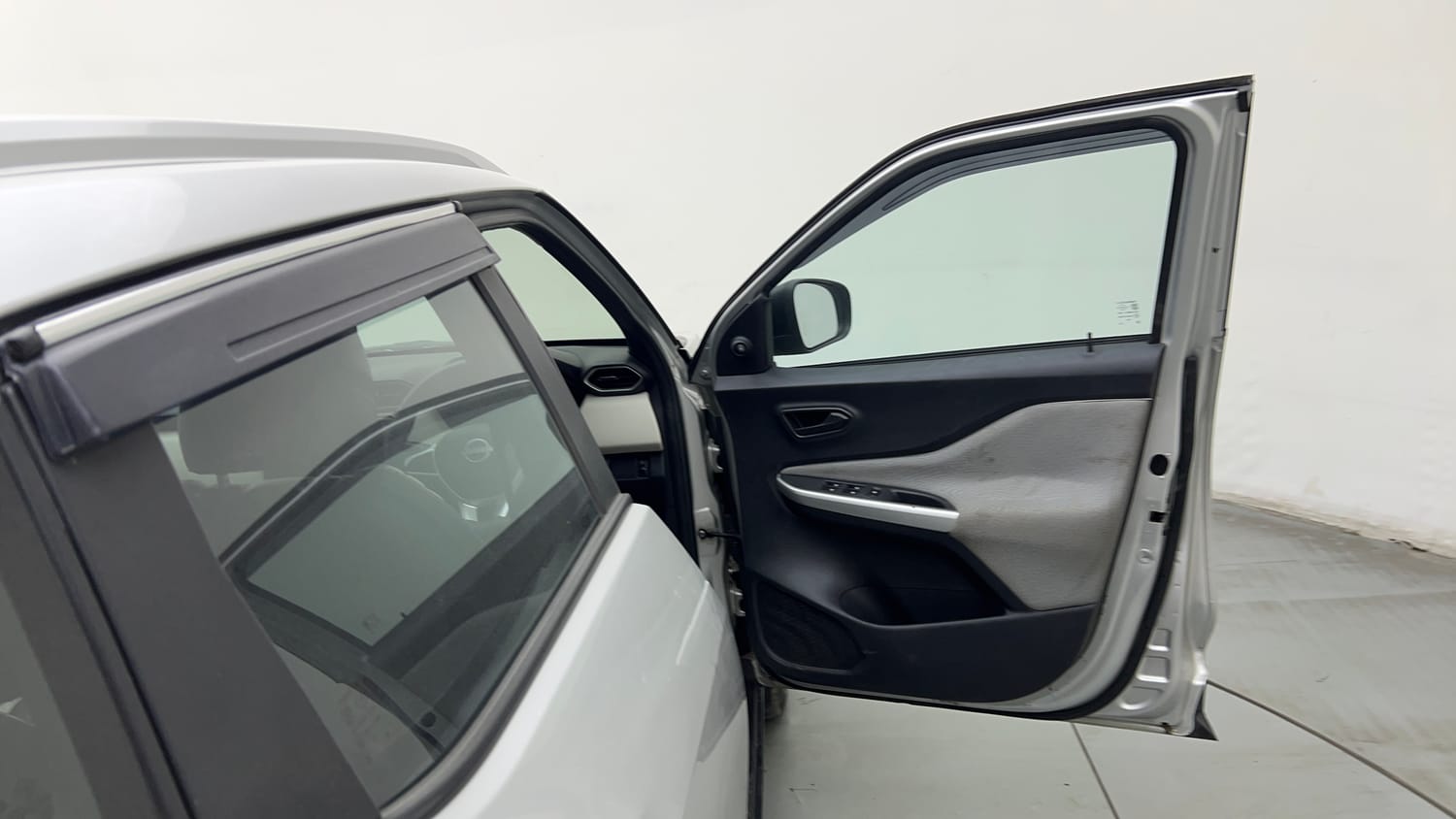Used 2022 Nissan Magnite XE Petrol Manual interior RIGHT FRONT DOOR OPEN VIEW