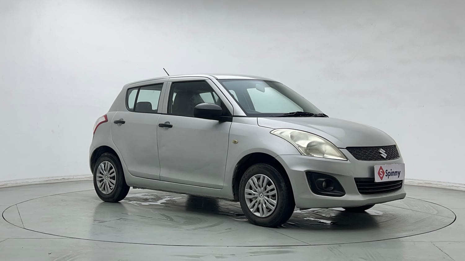 Used 2015 Maruti Suzuki Swift Lxi (O) Petrol Manual exterior RIGHT FRONT CORNER VIEW