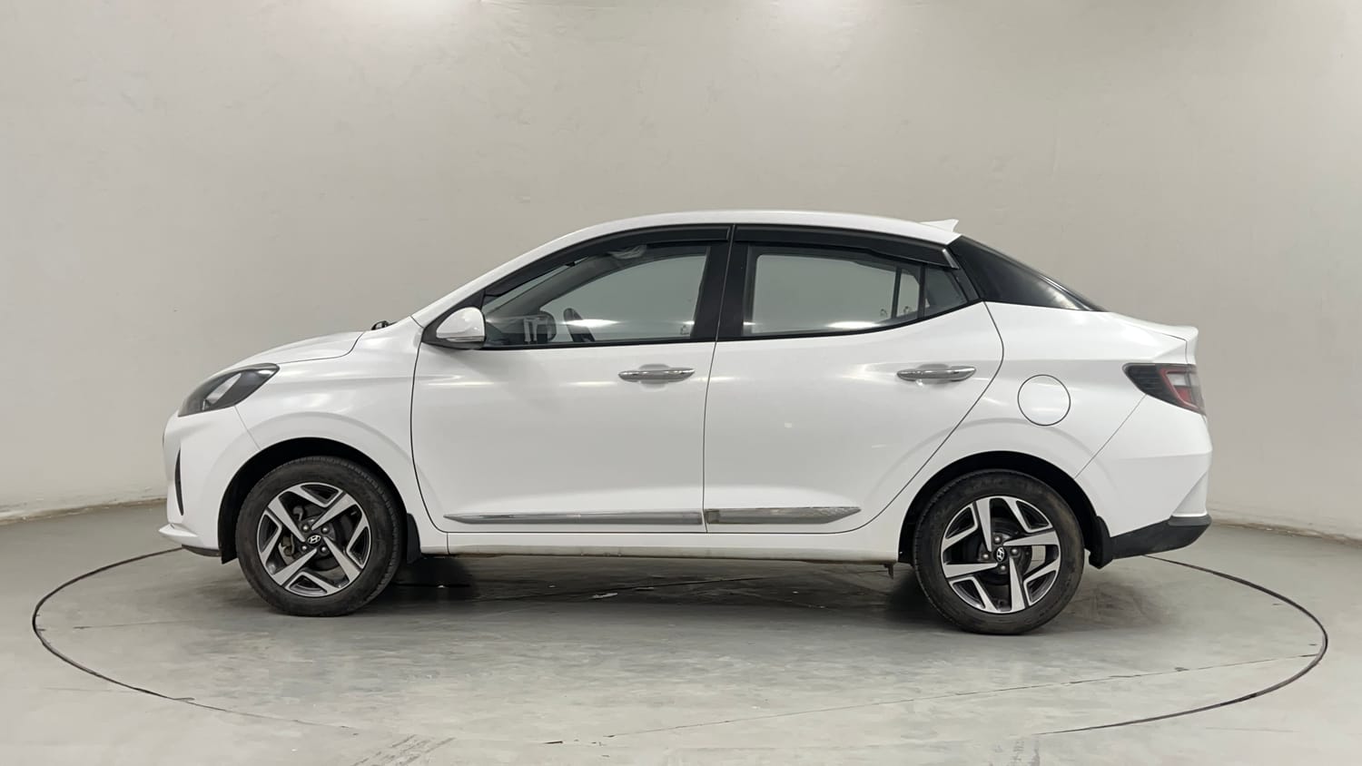Used 2022 Hyundai Aura SX 1.2 Petrol Petrol Manual exterior LEFT SIDE VIEW