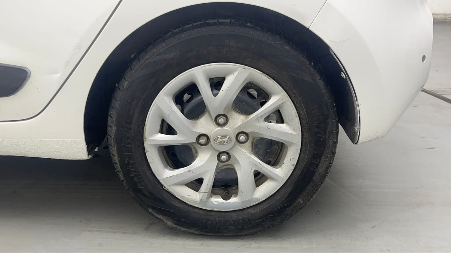 Used 2019 Hyundai Grand i10 Sportz 1.2 Kappa VTVT CNG (Outside Fitted) Cng Manual tyres LEFT REAR TYRE RIM VIEW