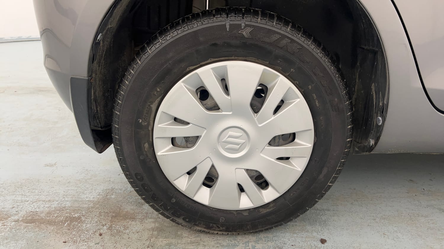 Used 2014 Maruti Suzuki Swift VXi Petrol Manual tyres RIGHT REAR TYRE RIM VIEW