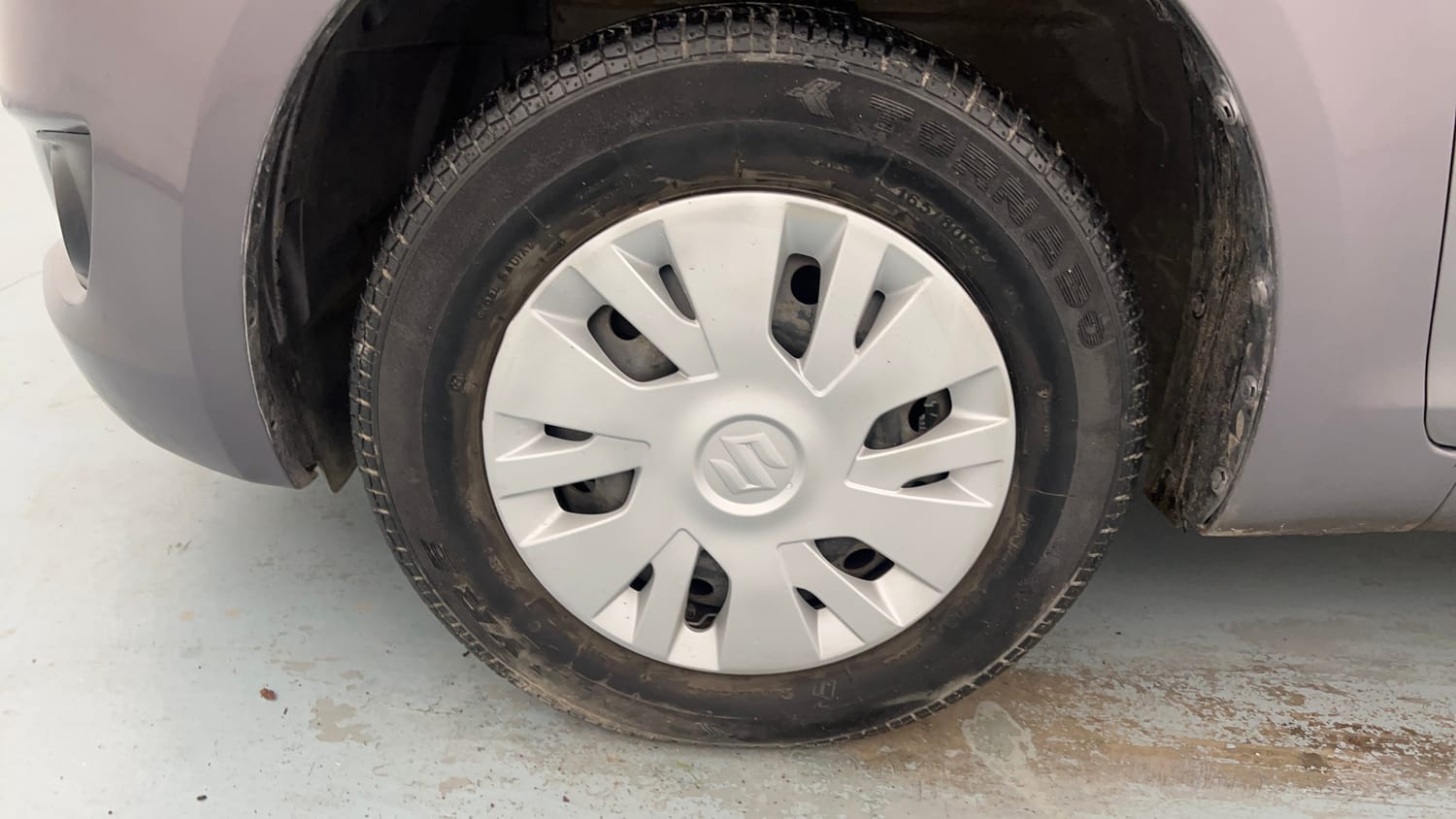 Used 2014 Maruti Suzuki Swift VXi Petrol Manual tyres LEFT FRONT TYRE RIM VIEW