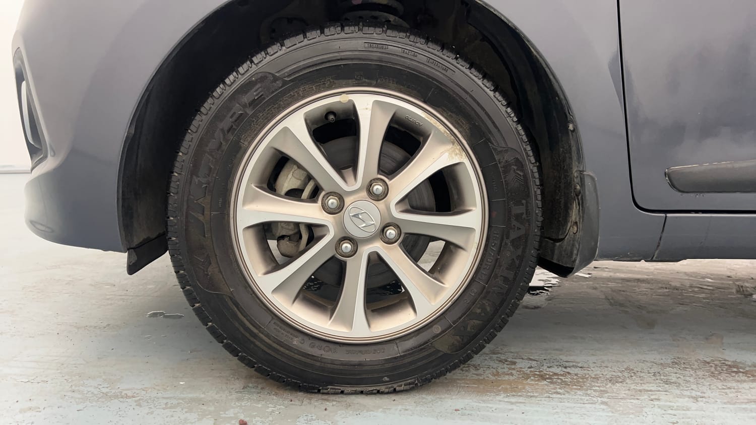 Used 2016 Hyundai Grand i10 Asta 1.2 Kappa VTVT (O) Petrol Manual tyres LEFT FRONT TYRE RIM VIEW
