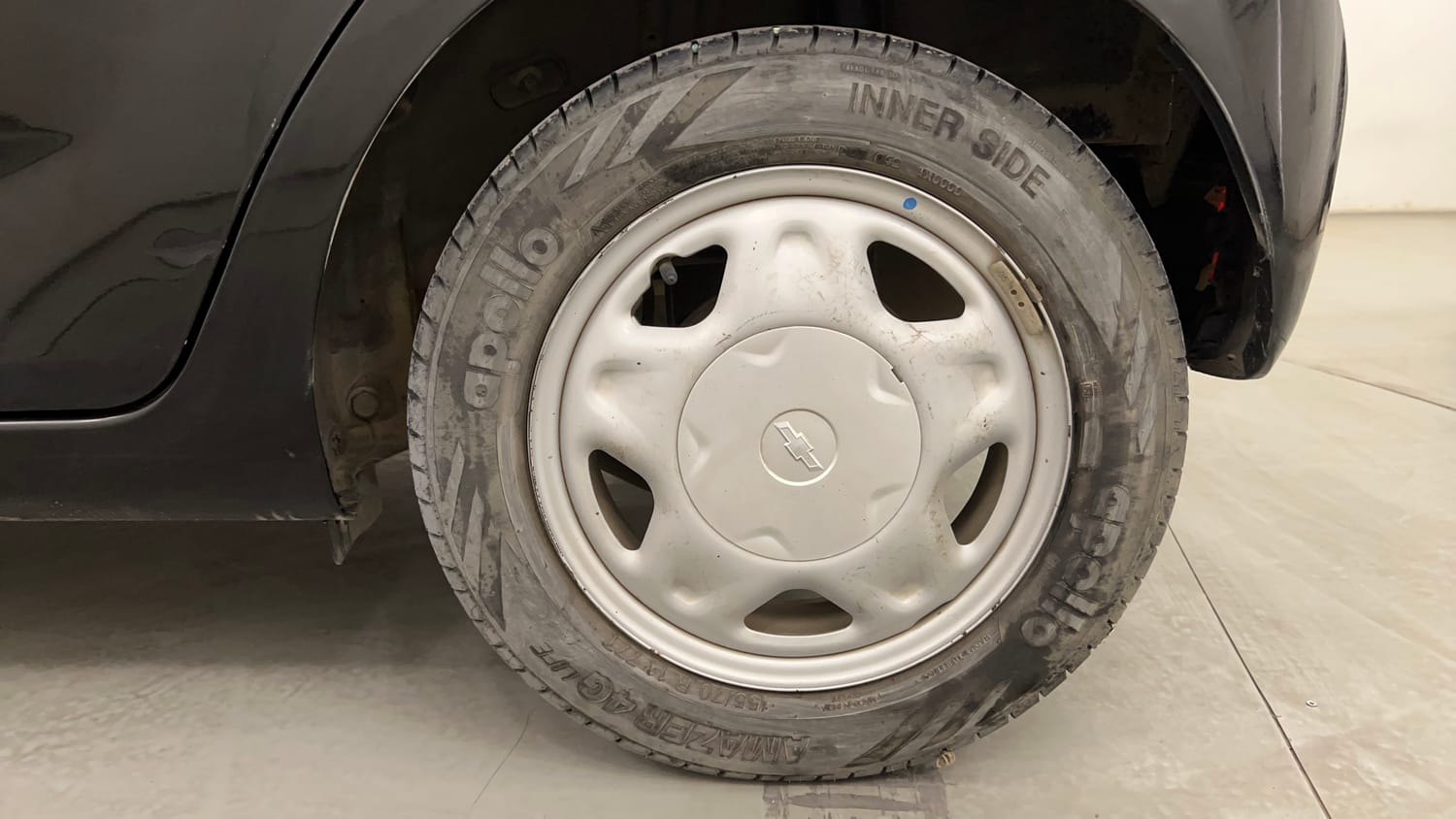 Used 2014 Chevrolet Beat LT Petrol Petrol Manual tyres LEFT REAR TYRE RIM VIEW
