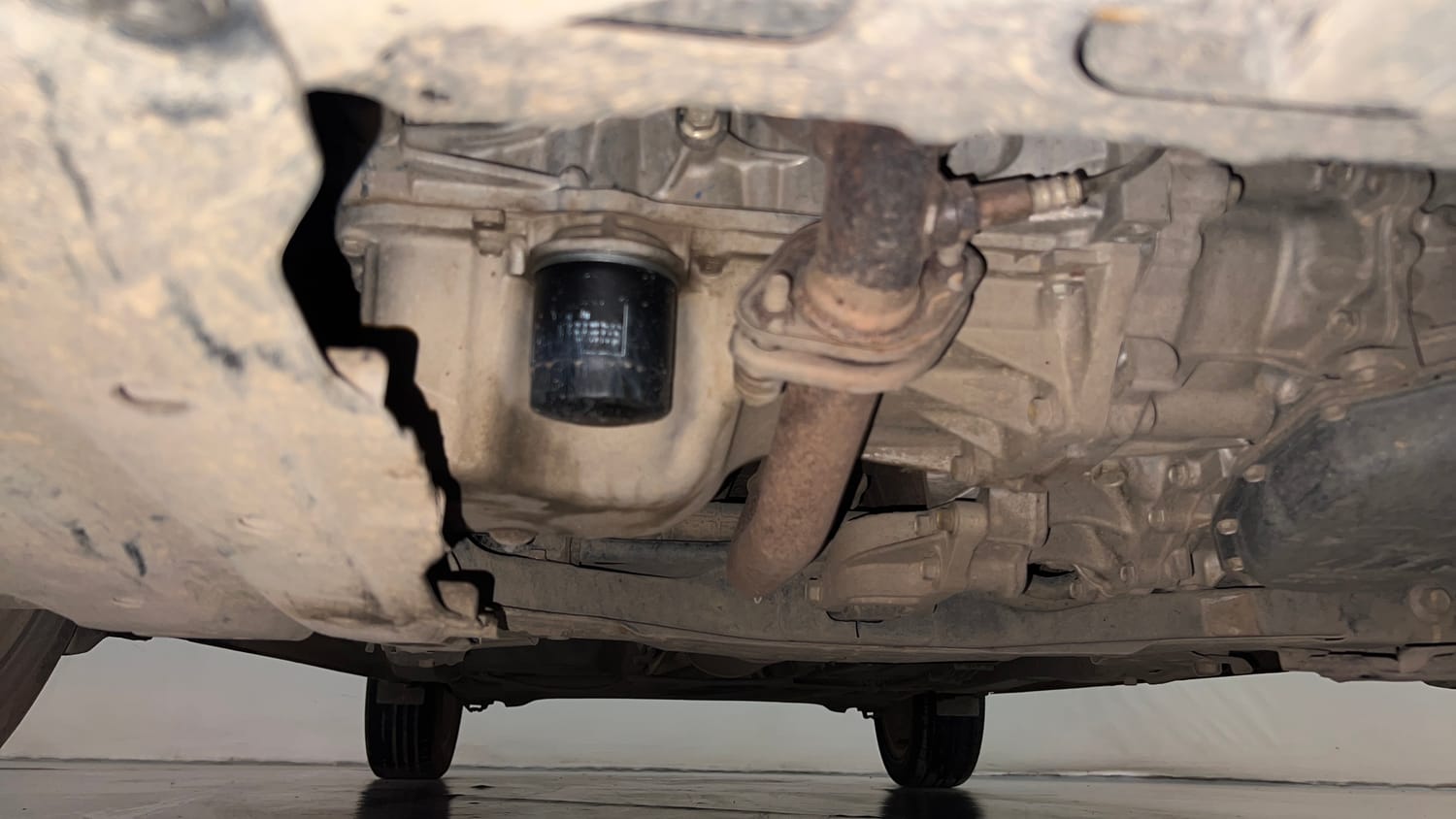Used 2017 Maruti Suzuki Baleno Zeta 1.2 AT Petrol Automatic extra FRONT LEFT UNDERBODY VIEW