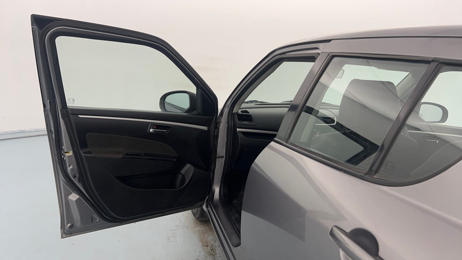 Used 2014 Maruti Suzuki Swift VXi Petrol Manual interior LEFT FRONT DOOR OPEN VIEW