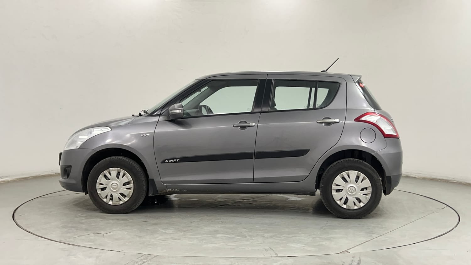 Used 2014 Maruti Suzuki Swift VXi Petrol Manual exterior LEFT SIDE VIEW