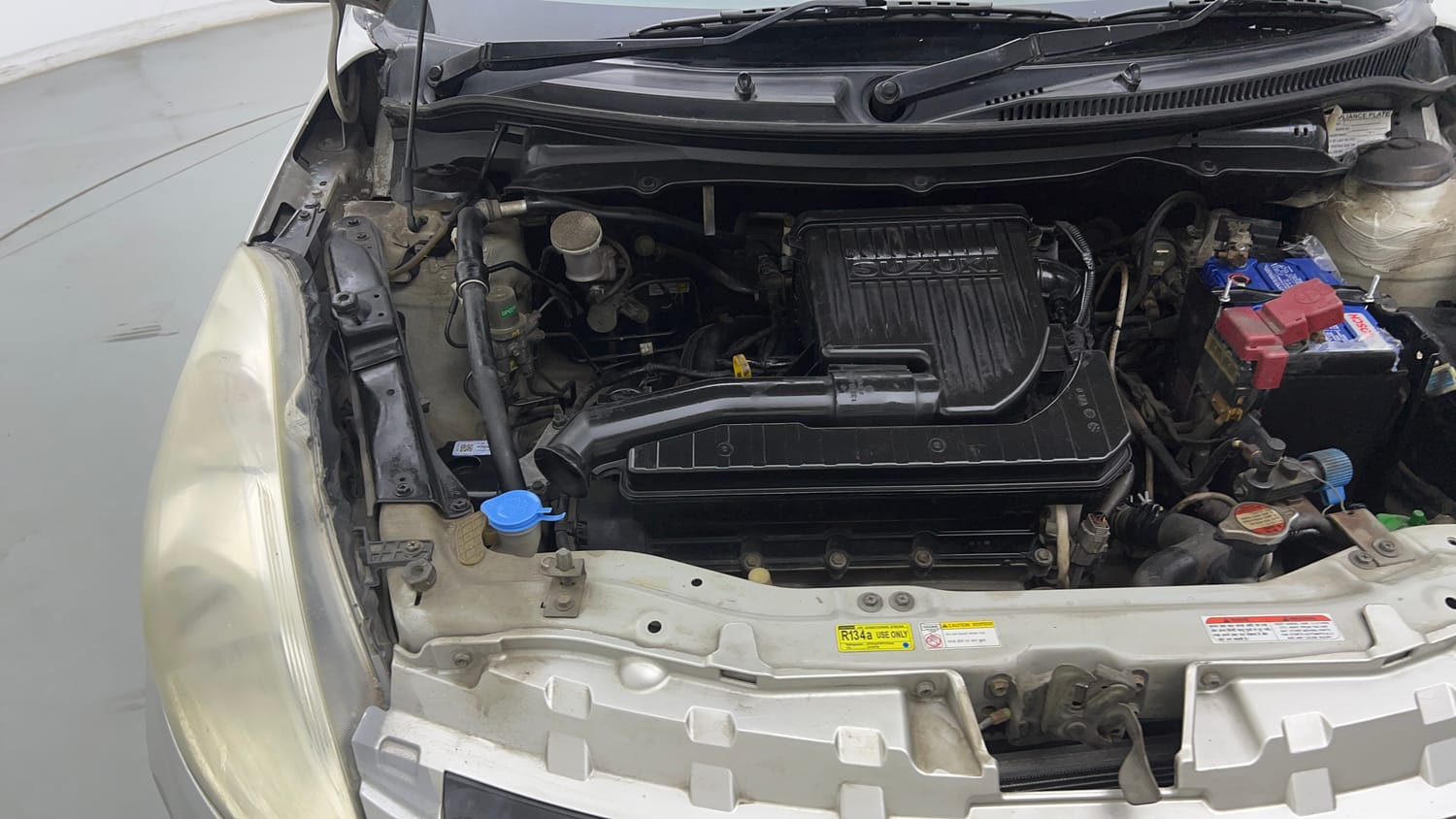 Used 2015 Maruti Suzuki Swift Lxi (O) Petrol Manual engine ENGINE RIGHT SIDE VIEW