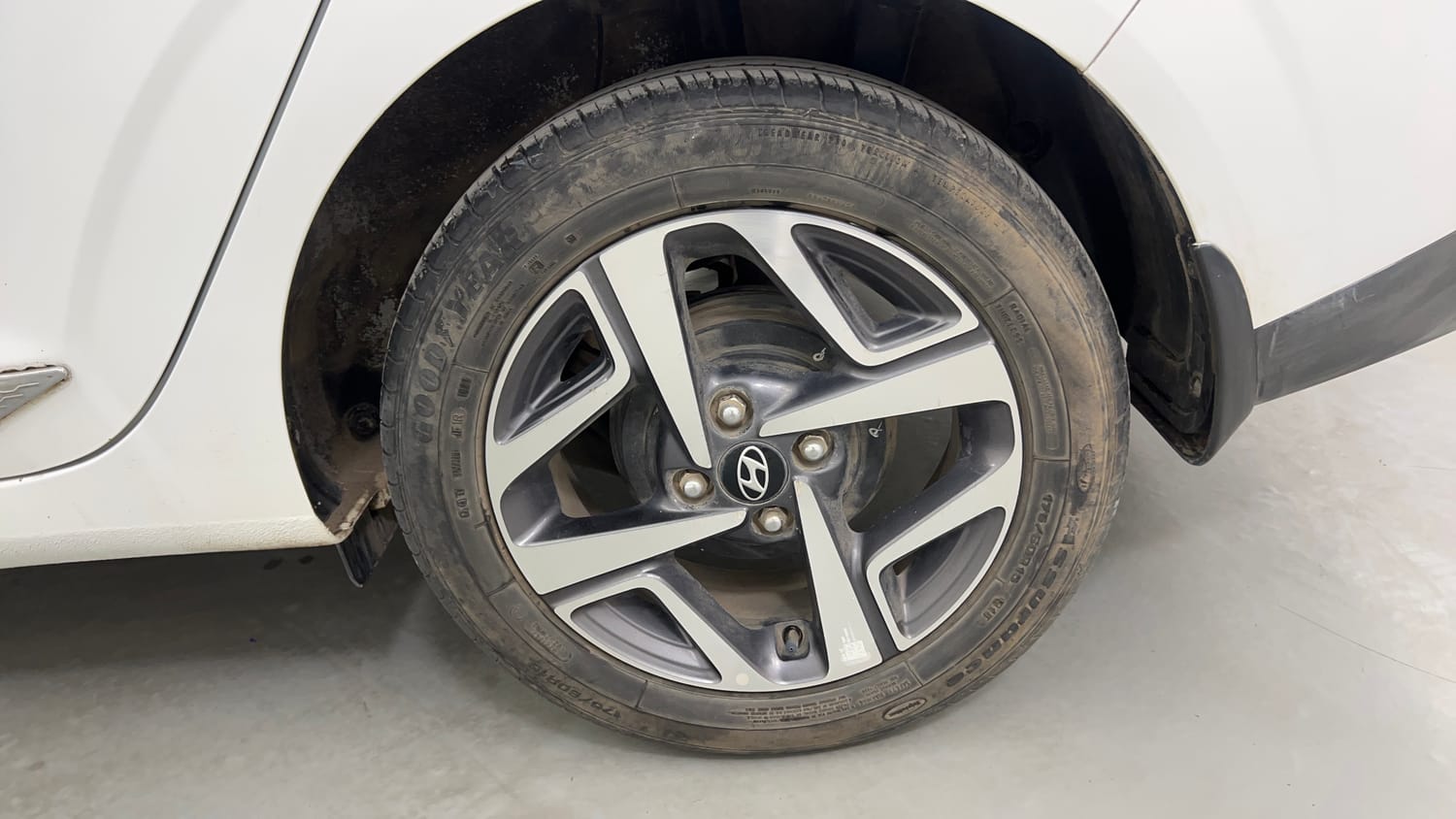Used 2022 Hyundai Aura SX 1.2 Petrol Petrol Manual tyres LEFT REAR TYRE RIM VIEW