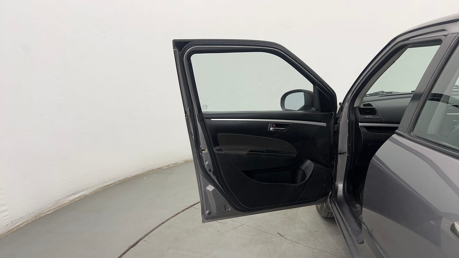 Used 2014 Maruti Suzuki Swift VXi Petrol Manual interior LEFT FRONT DOOR OPEN VIEW