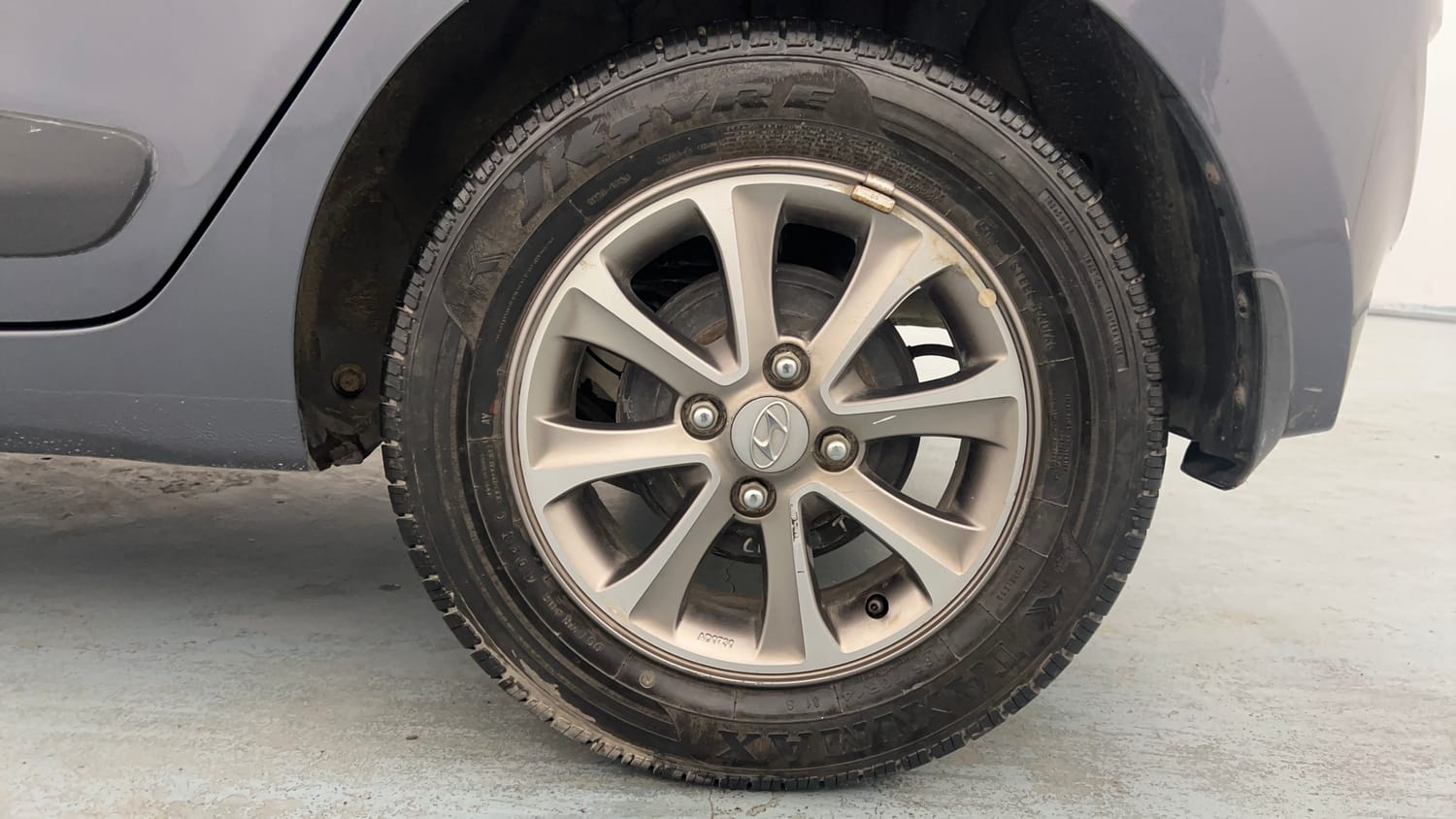 Used 2016 Hyundai Grand i10 Asta 1.2 Kappa VTVT (O) Petrol Manual tyres LEFT REAR TYRE RIM VIEW