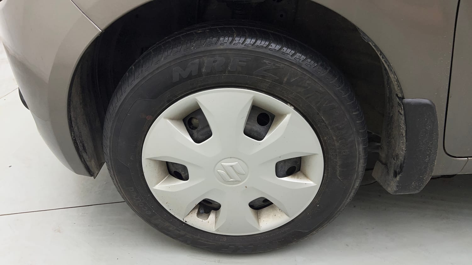 Used 2023 Maruti Suzuki Wagon R VXI 1.0 Petrol Manual tyres LEFT FRONT TYRE RIM VIEW