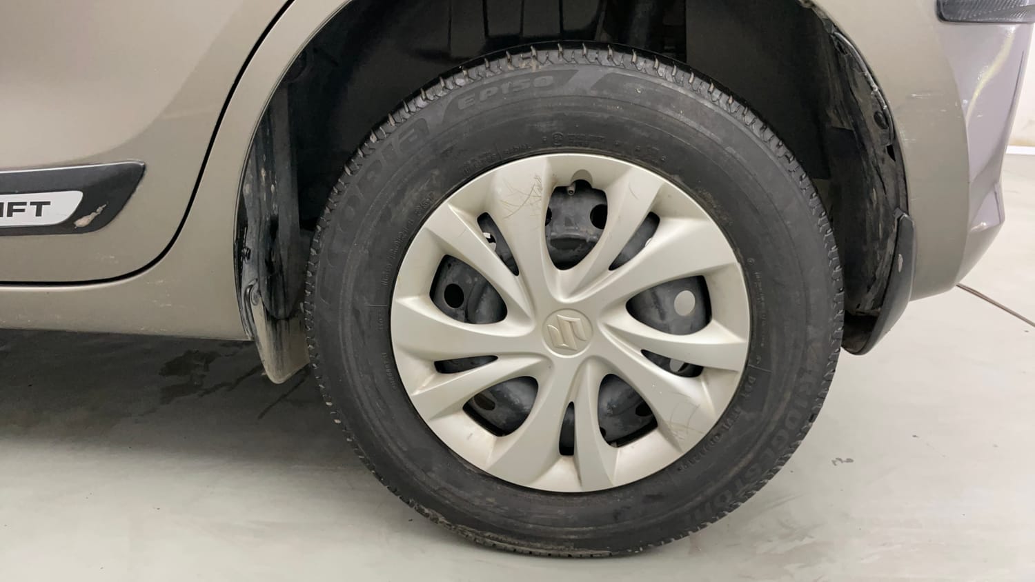 Used 2019 Maruti Suzuki Swift VXi AMT Petrol Automatic tyres LEFT REAR TYRE RIM VIEW