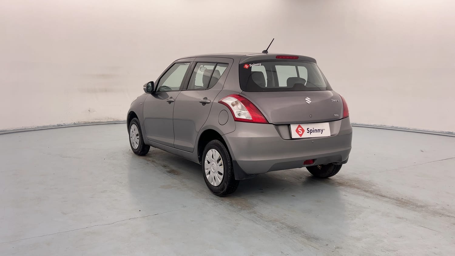 Used 2014 Maruti Suzuki Swift VXi Petrol Manual exterior LEFT REAR CORNER VIEW