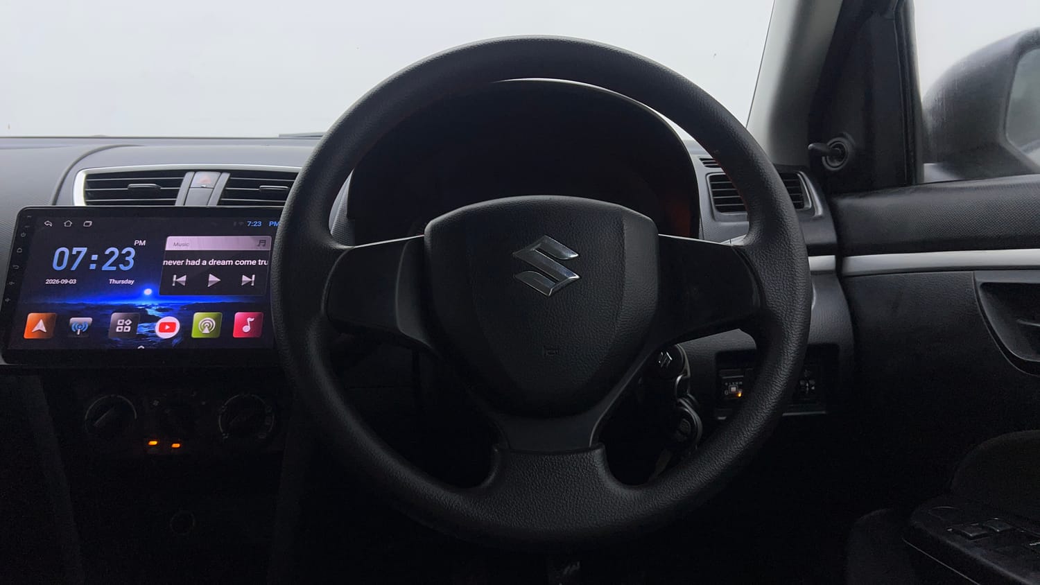 Used 2015 Maruti Suzuki Swift Lxi (O) Petrol Manual interior STEERING VIEW
