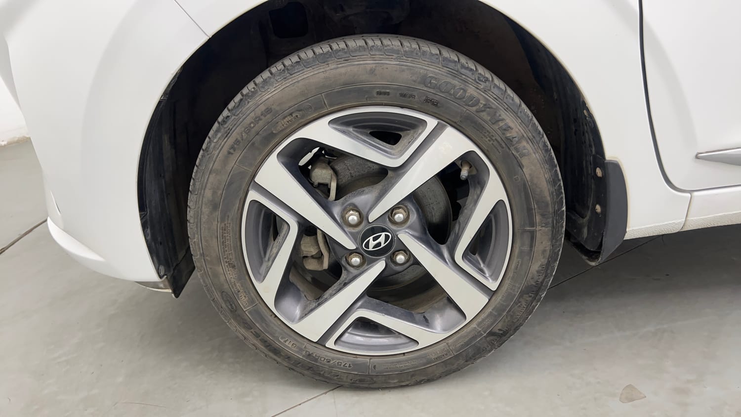 Used 2022 Hyundai Aura SX 1.2 Petrol Petrol Manual tyres LEFT FRONT TYRE RIM VIEW