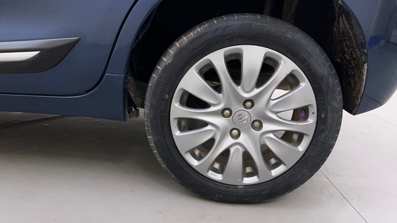 Used 2017 Maruti Suzuki Baleno Zeta 1.2 Petrol Manual tyres LEFT REAR TYRE RIM VIEW