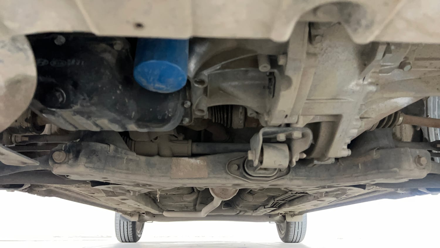 Used 2022 Hyundai Aura SX 1.2 Petrol Petrol Manual extra FRONT LEFT UNDERBODY VIEW