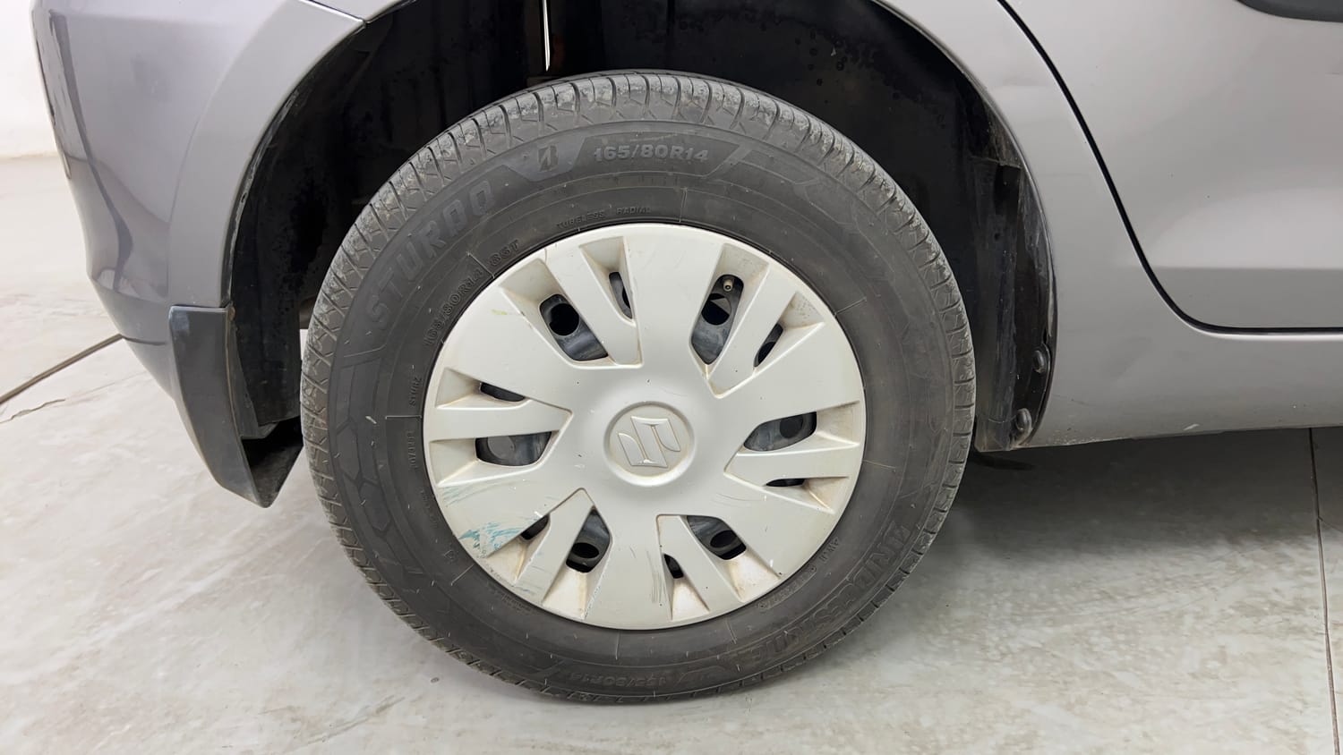 Used 2014 Maruti Suzuki Swift VXi Petrol Manual tyres RIGHT REAR TYRE RIM VIEW