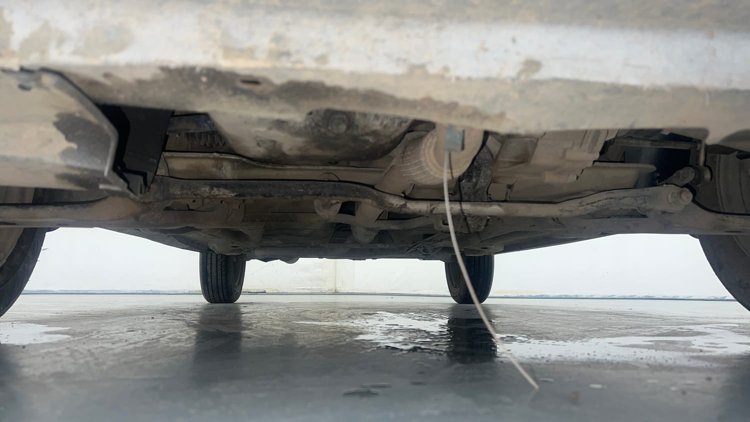 Used 2022 Tata Tiago XZ Petrol Manual extra FRONT LEFT UNDERBODY VIEW