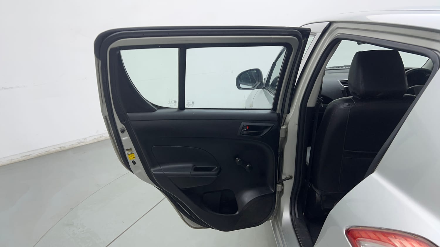 Used 2015 Maruti Suzuki Swift Lxi (O) Petrol Manual interior LEFT REAR DOOR OPEN VIEW