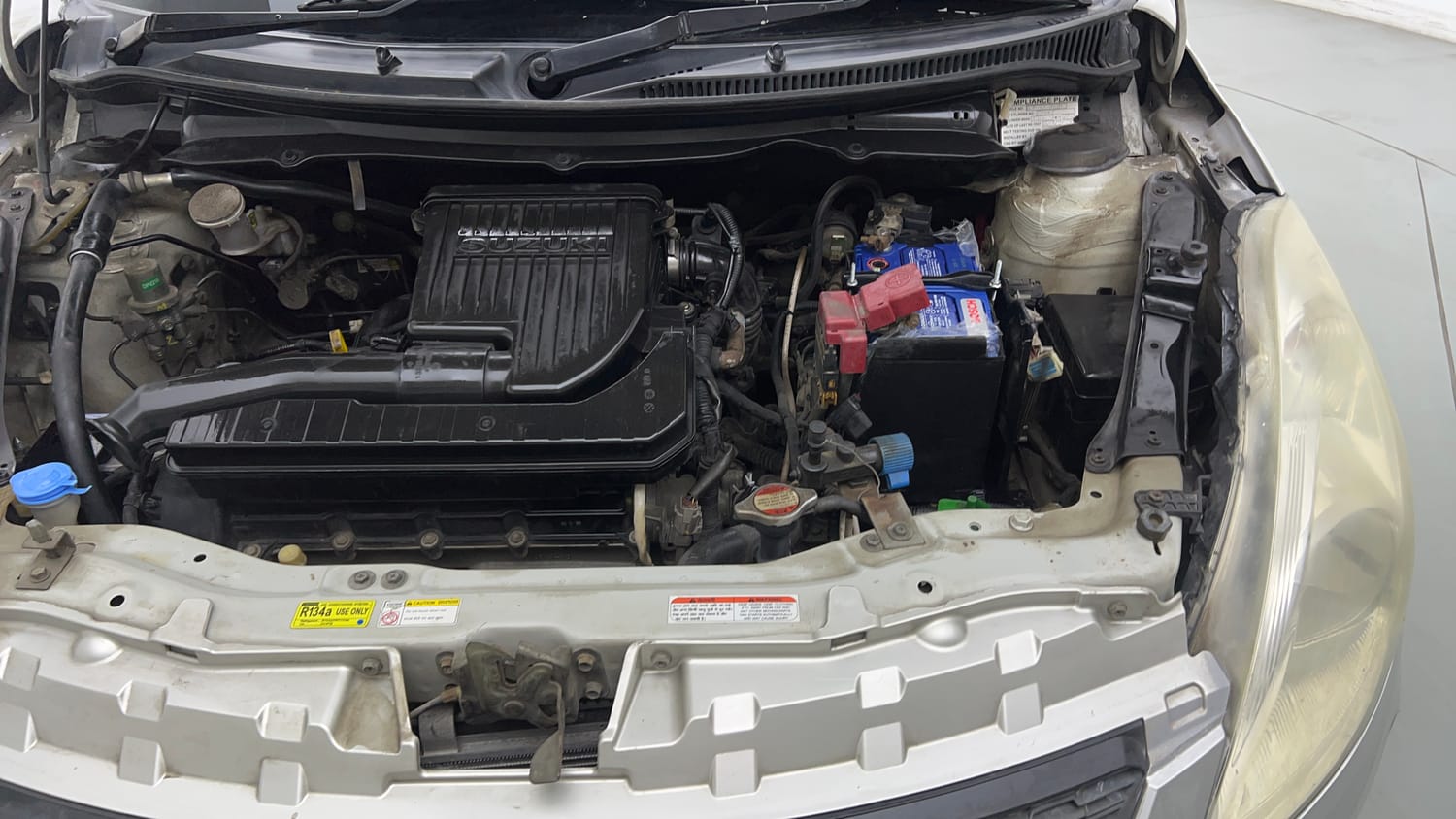 Used 2015 Maruti Suzuki Swift Lxi (O) Petrol Manual engine ENGINE LEFT SIDE VIEW