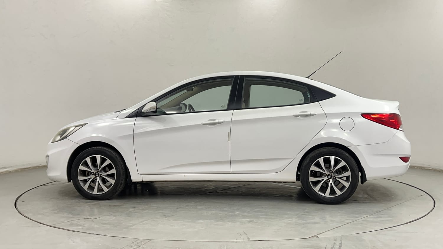 Used 2013 Hyundai Verna Fluidic 1.6 VTVT SX Petrol Manual exterior LEFT SIDE VIEW