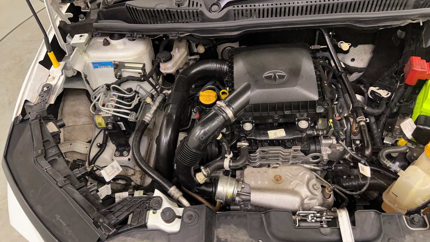 Used 2023 Tata Nexon Creative Plus S 1.2 Revotron Petrol 6AMT Petrol Automatic engine ENGINE RIGHT SIDE VIEW