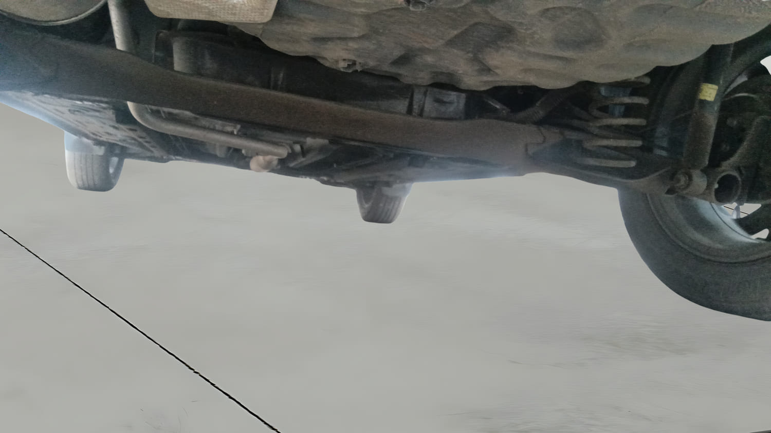 Used 2023 Nissan Magnite XV AMT Petrol Automatic extra REAR RIGHT UNDERBODY VIEW