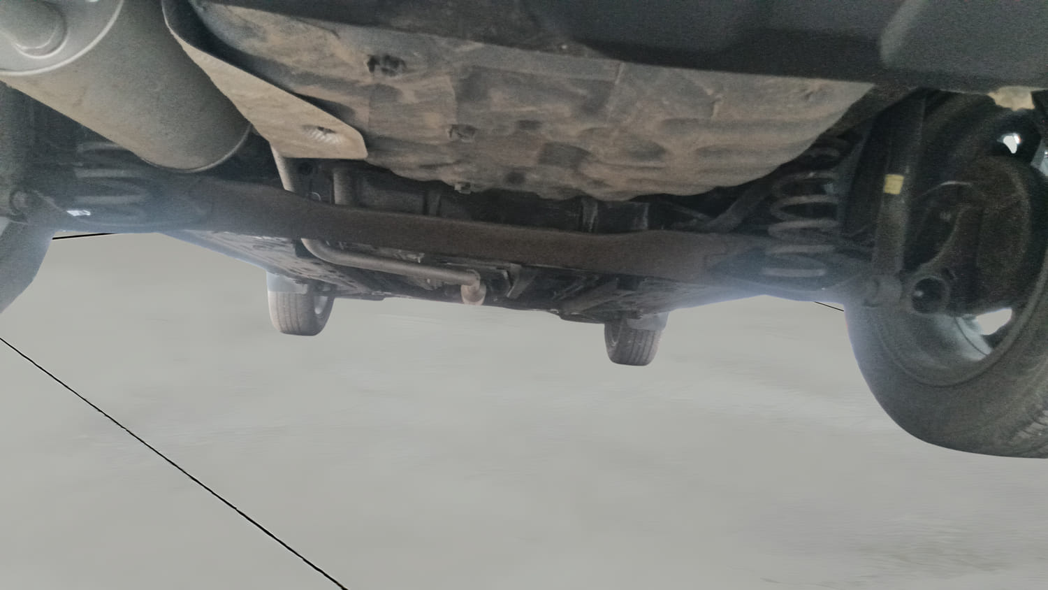 Used 2023 Nissan Magnite XV AMT Petrol Automatic extra REAR UNDERBODY VIEW (TAKEN FROM REAR)