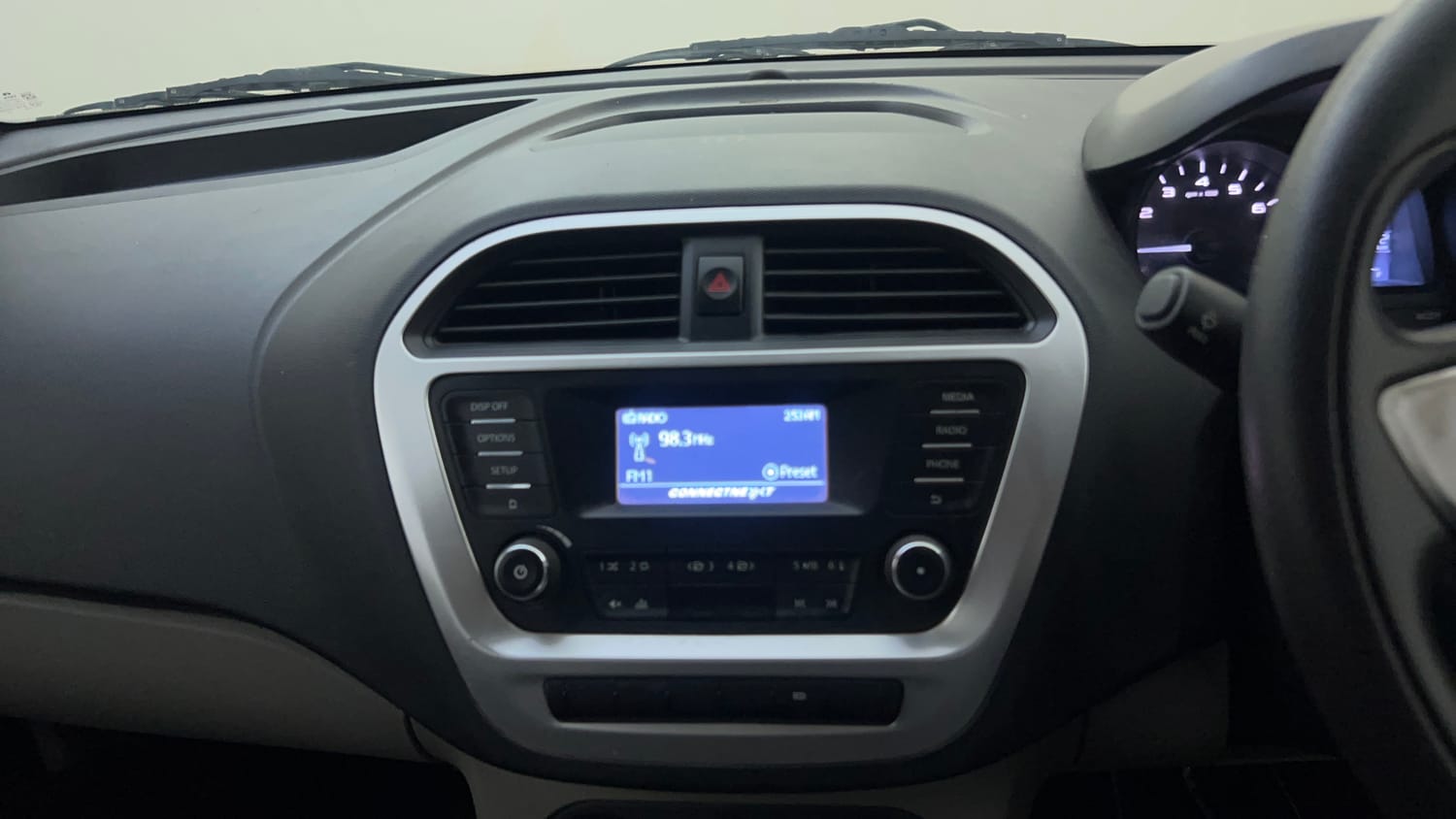Used 2016 Tata Tiago Revotron XT Petrol Manual top_features Integrated (in-dash) music system