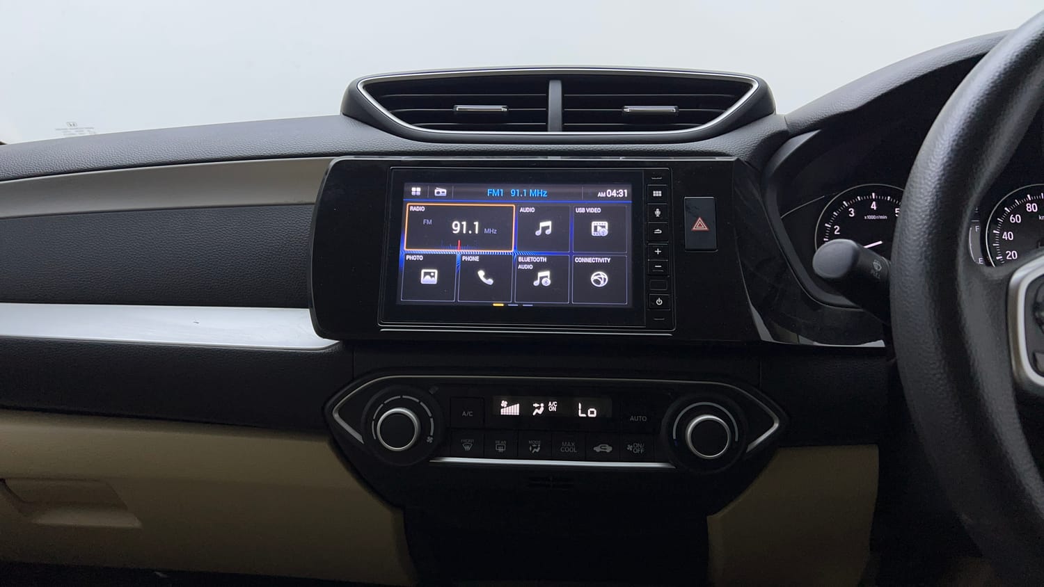 Used 2022 Honda Amaze VX CVT 1.2 Petrol Petrol Automatic top_features Integrated (in-dash) music system