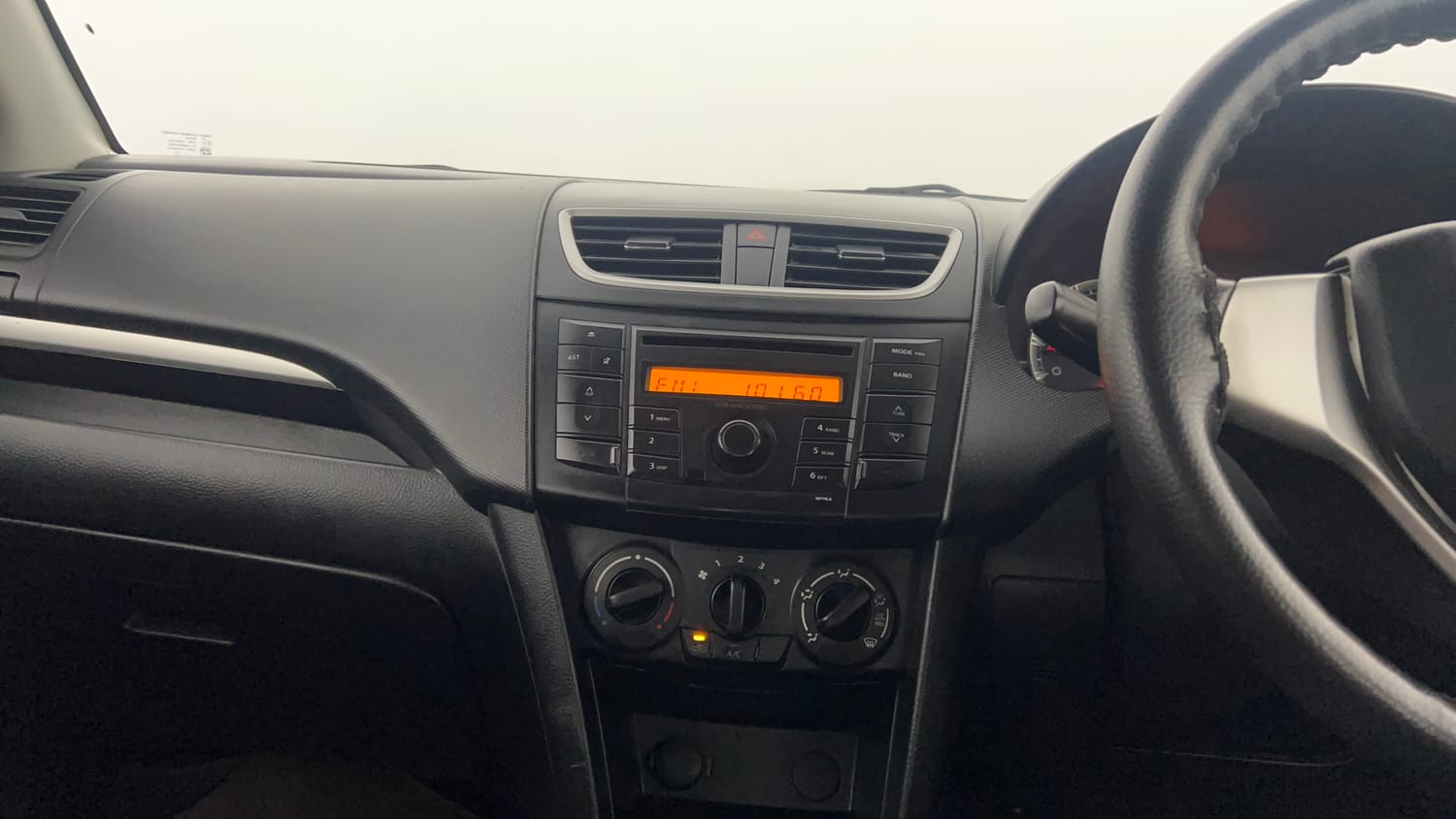 Used 2013 Maruti Suzuki Swift VXi Petrol Manual interior MUSIC SYSTEM & AC CONTROL VIEW