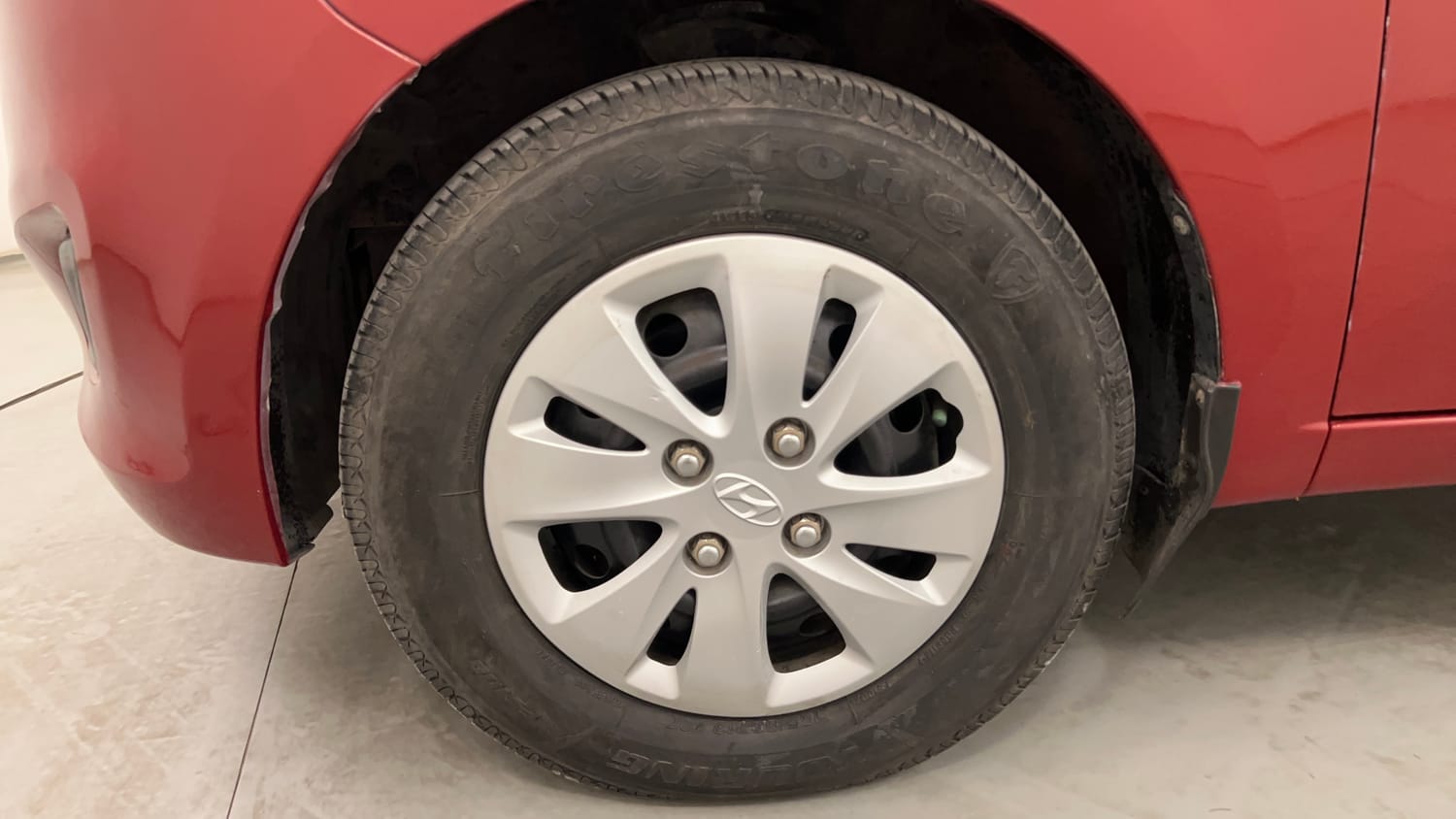 Used 2013 Hyundai i10 Sportz 1.2 AT Kappa2 Petrol Automatic tyres LEFT FRONT TYRE RIM VIEW