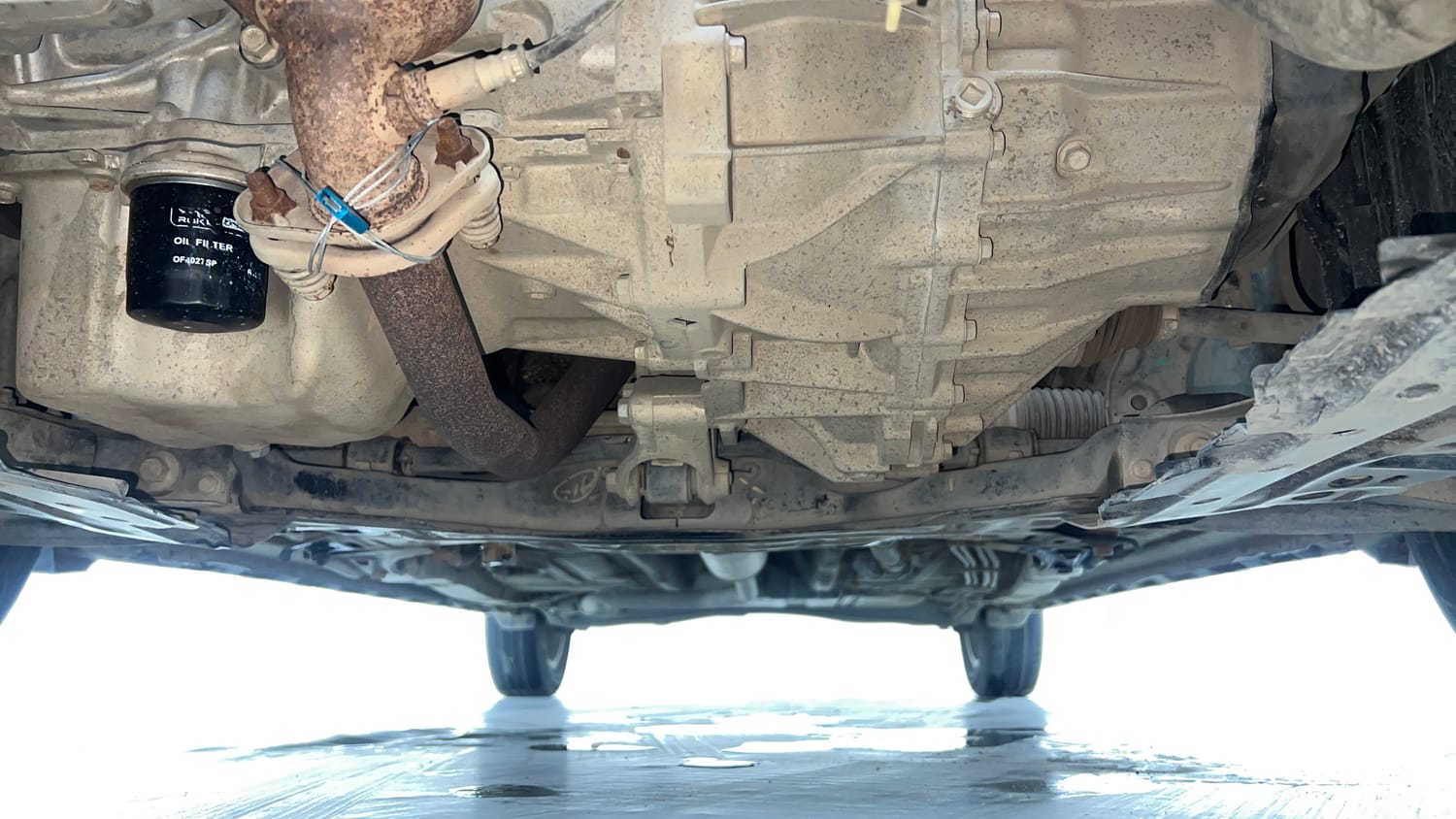 Used 2020 Maruti Suzuki XL6 Zeta MT Petrol Petrol Manual extra FRONT LEFT UNDERBODY VIEW