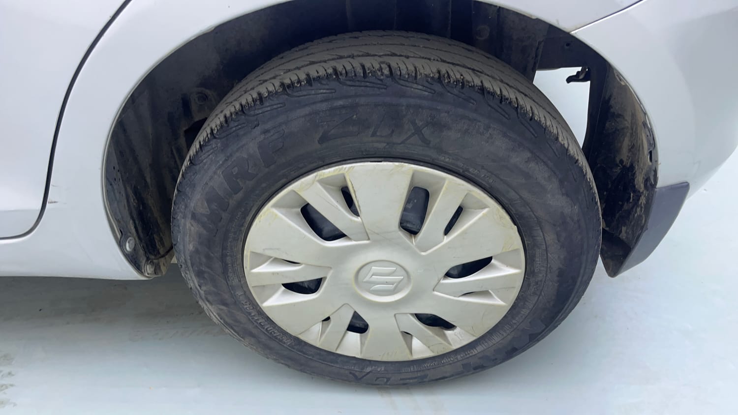 Used 2013 Maruti Suzuki Swift VXi Petrol Manual tyres LEFT REAR TYRE RIM VIEW