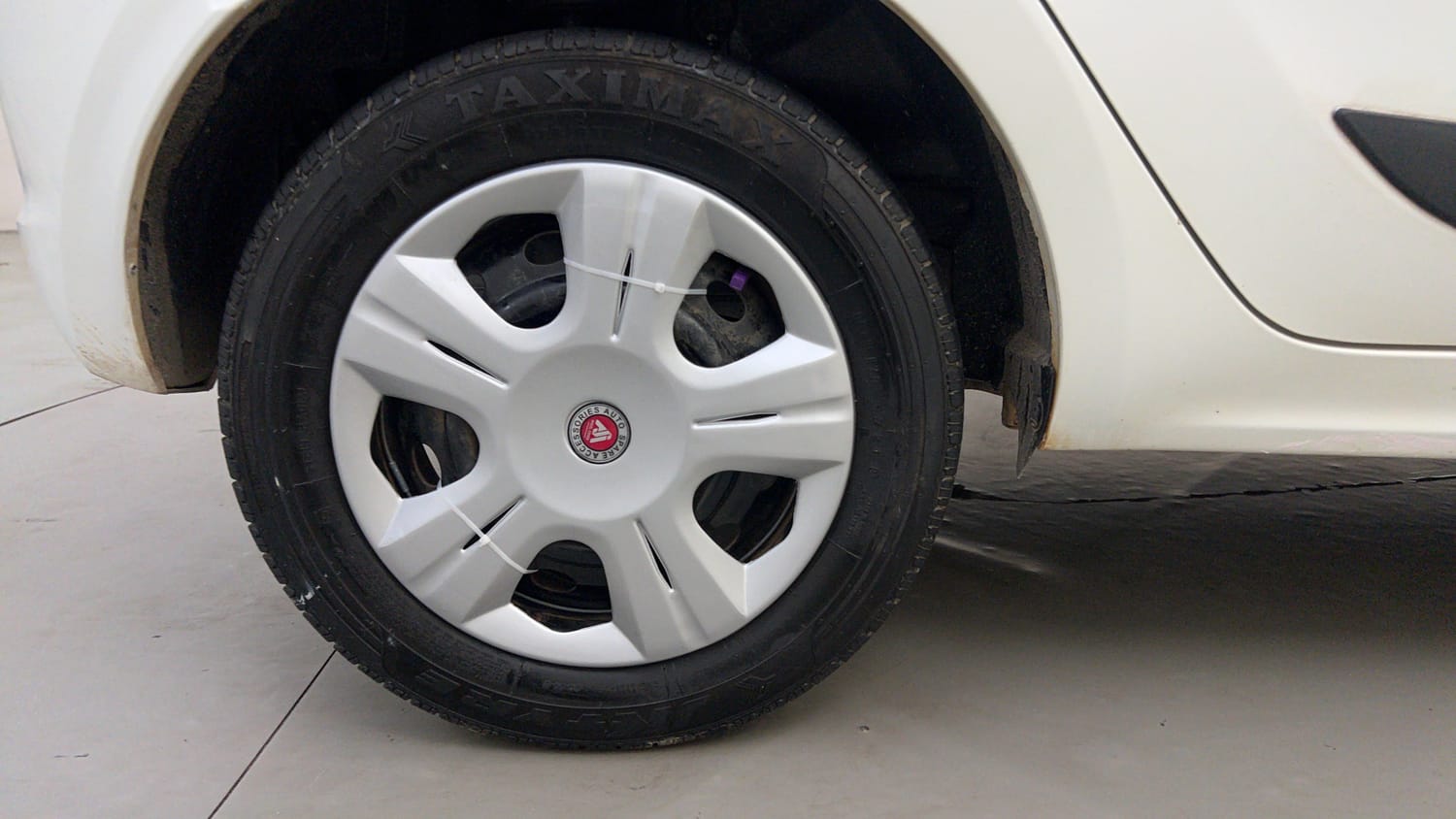 Used 2016 Tata Tiago Revotron XT Petrol Manual tyres RIGHT REAR TYRE RIM VIEW