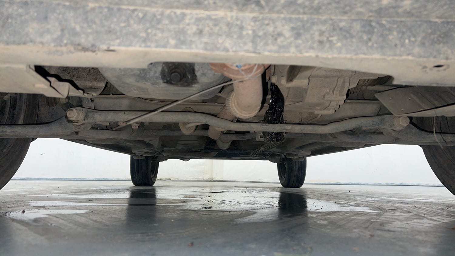 Used 2022 Tata Tigor XZ Plus CNG Cng Manual extra FRONT LEFT UNDERBODY VIEW