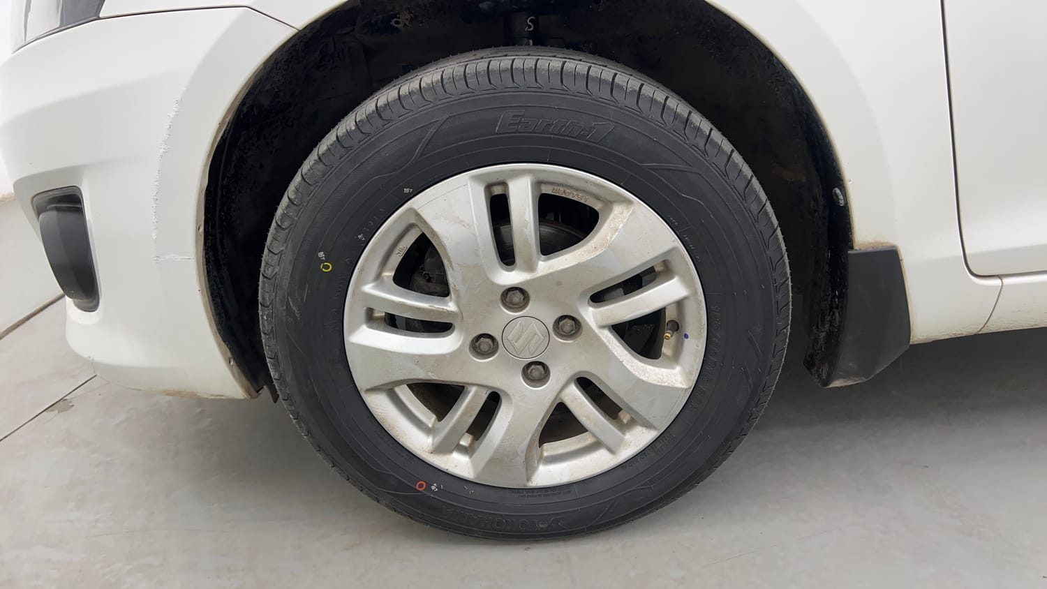 Used 2012 Maruti Suzuki Swift Dzire ZXI Petrol Manual tyres LEFT FRONT TYRE RIM VIEW