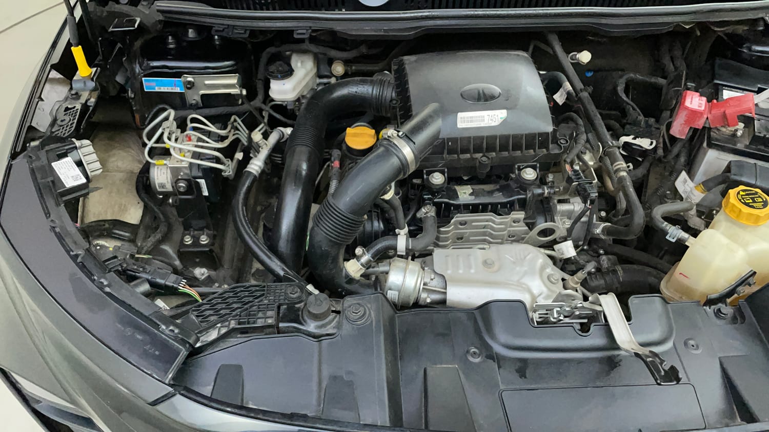 Used 2025 Tata Nexon Creative Plus (S) 1.2 6AMT Dark Edition Petrol Automatic engine ENGINE RIGHT SIDE VIEW
