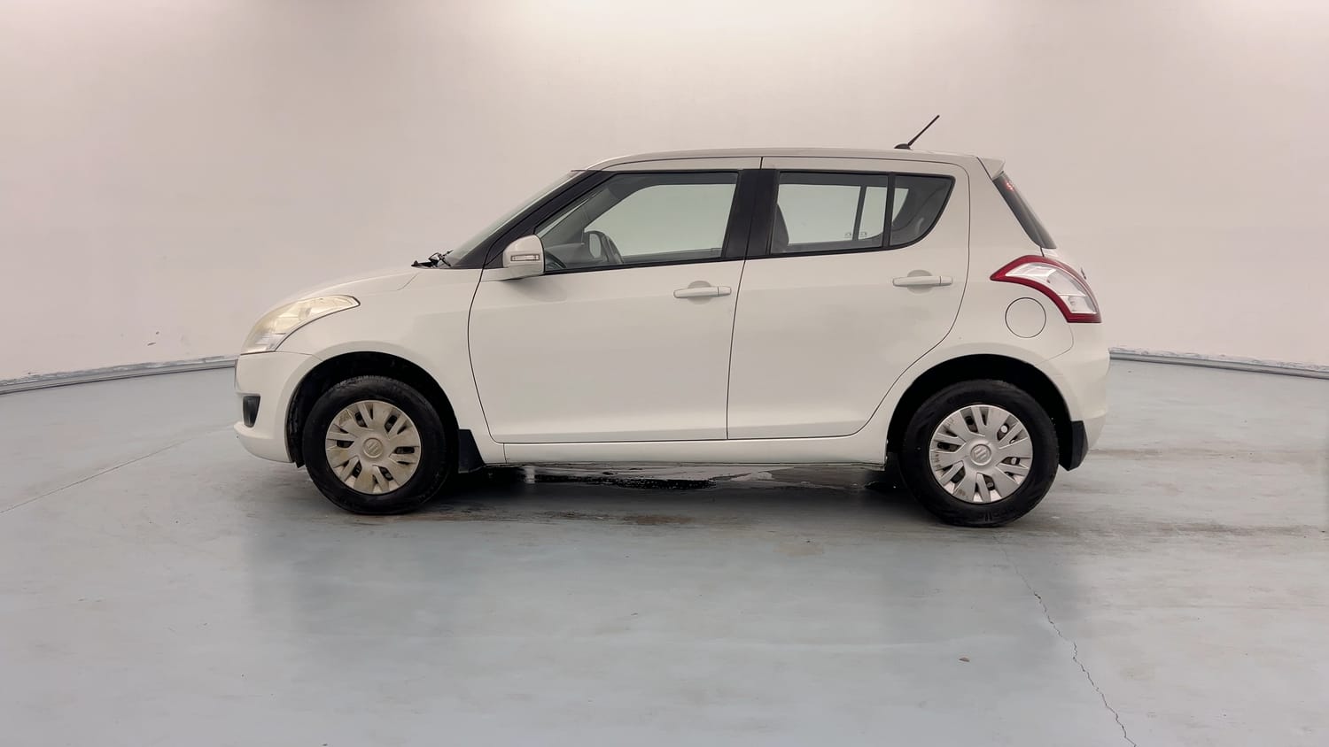 Used 2013 Maruti Suzuki Swift VXi Petrol Manual exterior LEFT SIDE VIEW