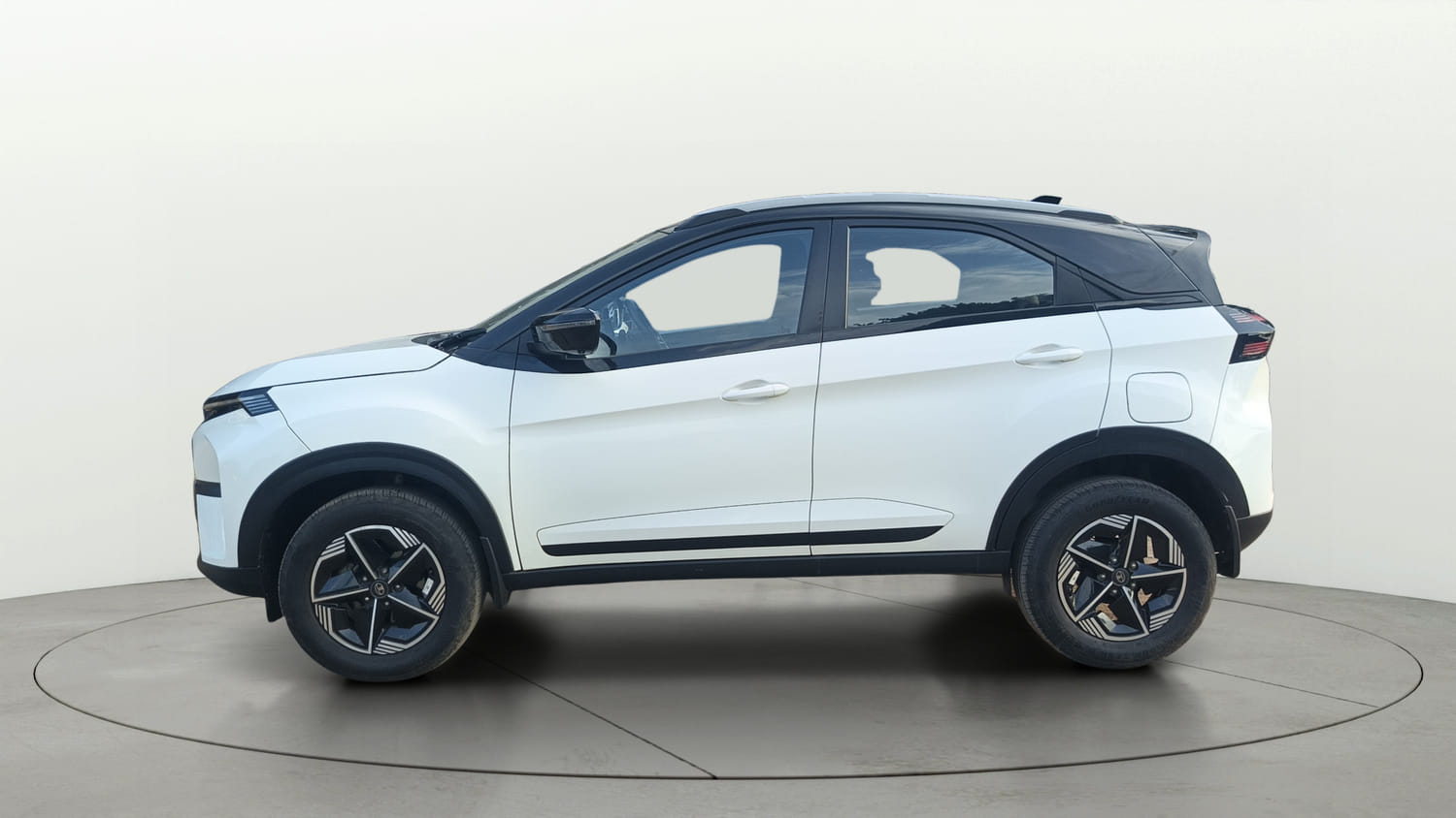 Used 2024 Tata Nexon Fearless Plus S 1.2 Revotron Petrol 7DCA DT Petrol Automatic exterior LEFT SIDE VIEW