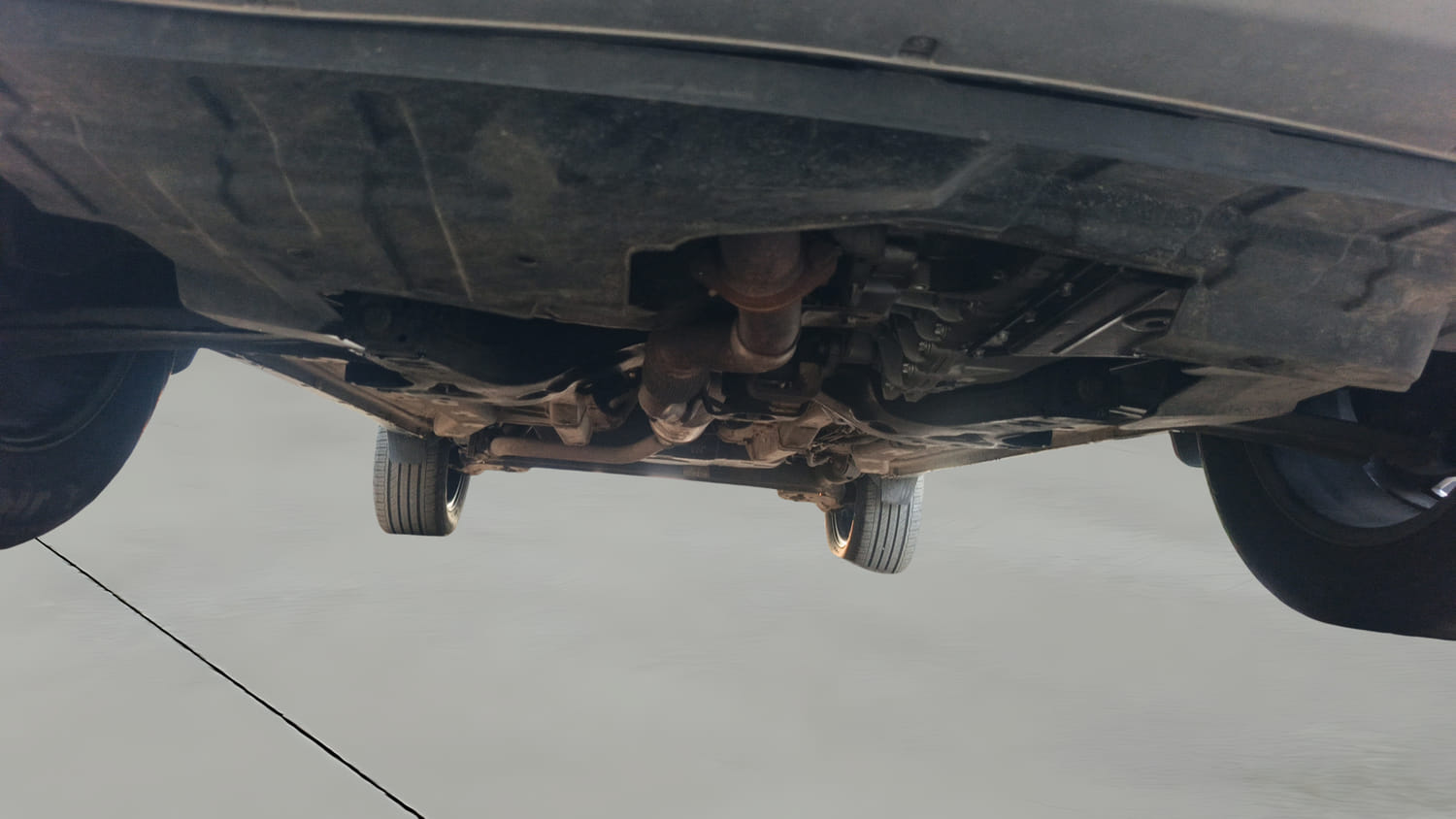 Used 2024 Tata Nexon Fearless Plus S 1.2 Revotron Petrol 7DCA DT Petrol Automatic extra FRONT LEFT UNDERBODY VIEW